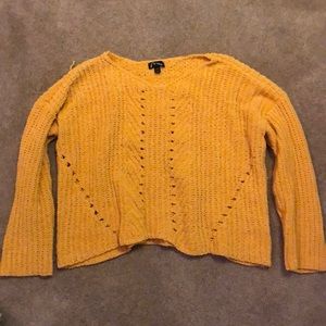 yellow sweater